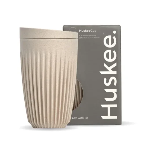 Huskee Cup 12oz Natural in front of box it comes in